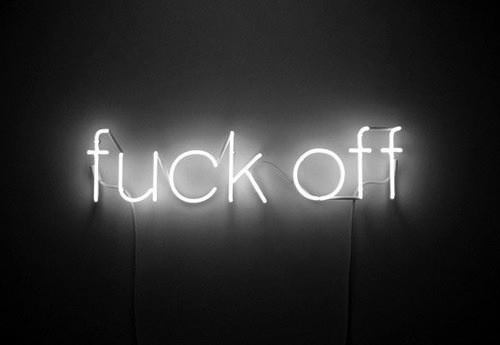 neon lettering that says fuck off