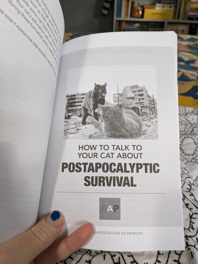 a page of a book showing two cats and the title: how to talk to your cats about postapocalyptic survival
