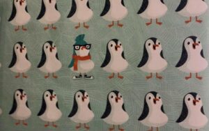 wrapping paper covered in penguins