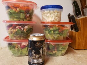 many food storage containers stacked up neatly