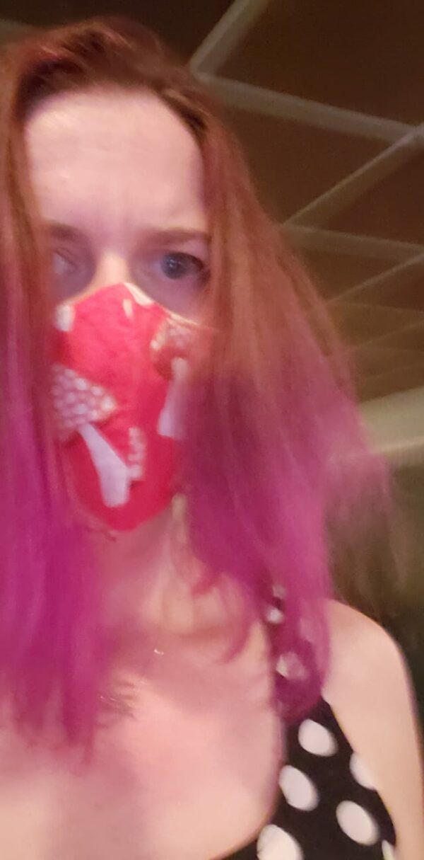 blurry selfie in a dark building