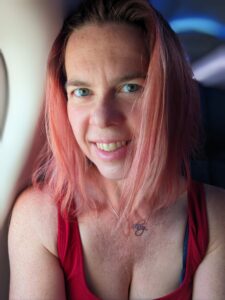 selfie in the cramped seat of an airplane
