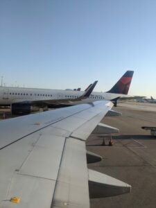 view along an airplane wing from inside the plane