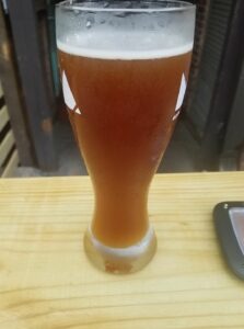 a tall glass of beer