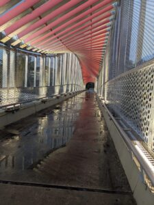 what looks like a bridge covered with an undulating metal roof