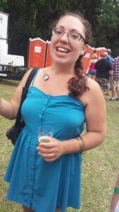 a person in a summer dress is talking during a picture