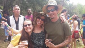 three people are making faces for a group shot