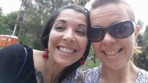 two people are over smiling for a picture