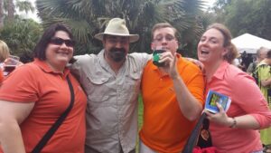 four people are paused for a photo