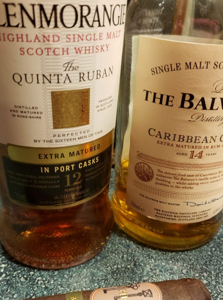 two bottles of scotch, one is Glenmorangie and the other Balvenie Caribbean Cask