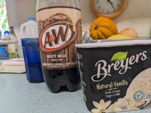 close up of a tub of ice cream and root beer