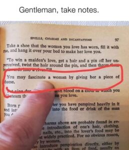 a finger is pointing to a page in a book with a line of text circled that says "you may fascinate a woman by giving her a piece of cheese"