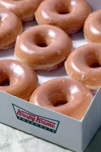 close up of a tray of Krispy Kreme glazed doughnuts